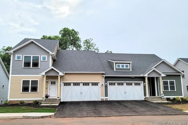 craftsman-style home featuring a garage