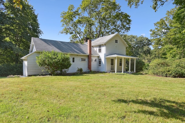 view of front of home with a front lawn