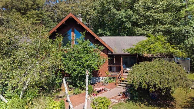 view of front of home featuring a wooden deck