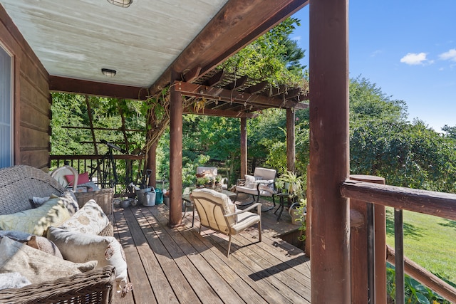 wooden terrace featuring an outdoor living space