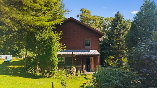 exterior space with a yard