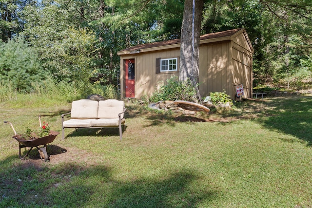 view of outdoor structure with a yard