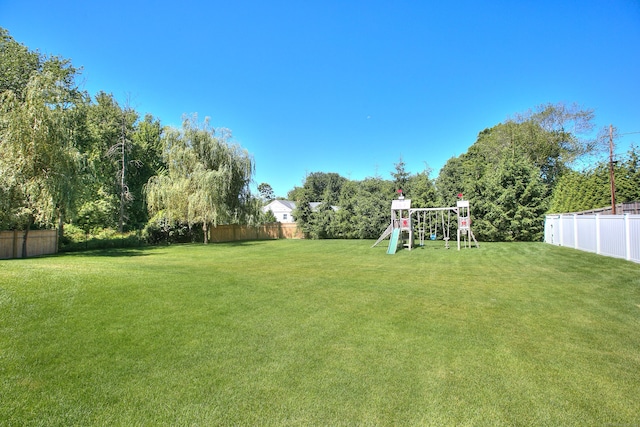 view of yard featuring a playground