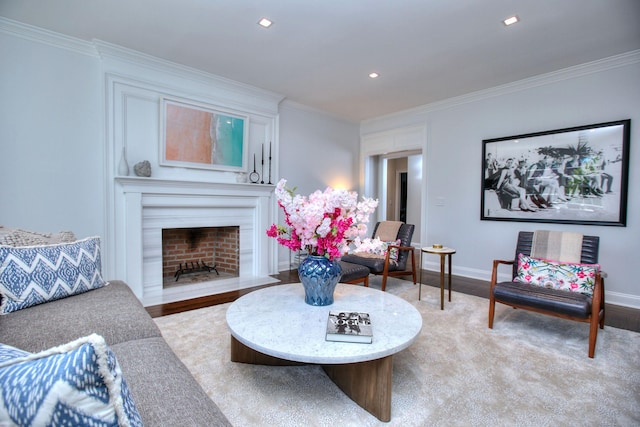 living room with crown molding and light hardwood / wood-style flooring