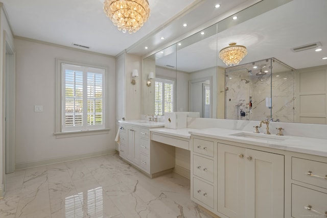 bathroom with ornamental molding, vanity, a shower with shower door, and an inviting chandelier