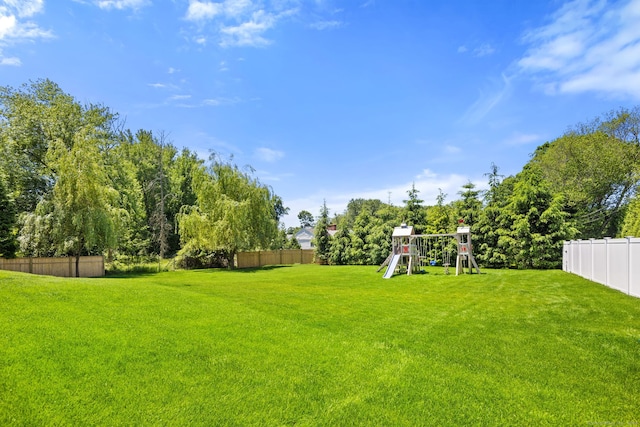 view of yard featuring a playground