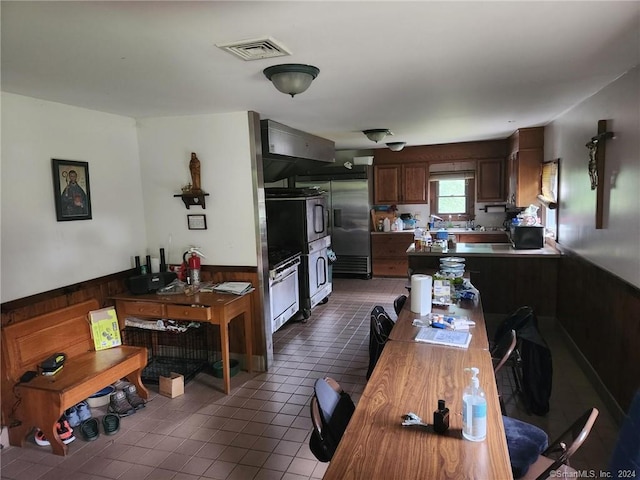 interior space featuring dark tile patterned flooring