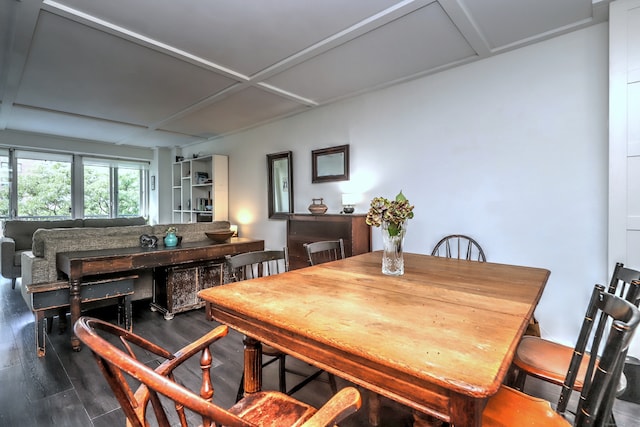 dining space featuring dark hardwood / wood-style flooring