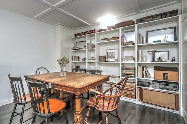 dining area featuring baseboards and dark wood-type flooring