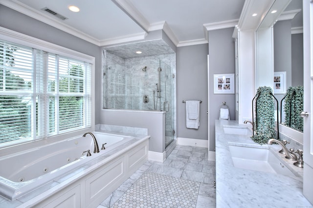 full bathroom with crown molding, a jetted tub, visible vents, and a sink