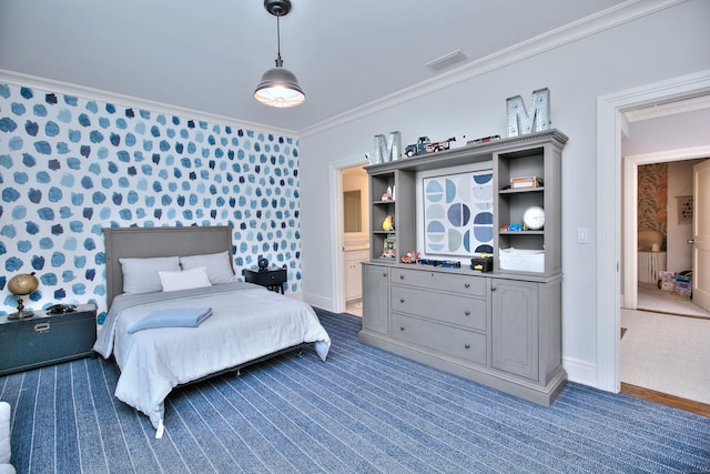 bedroom with baseboards, carpet floors, crown molding, and wallpapered walls