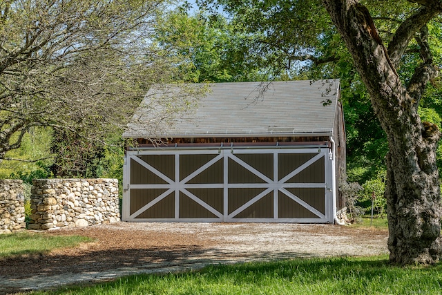 view of outbuilding with a garage