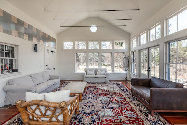 interior space with french doors and vaulted ceiling