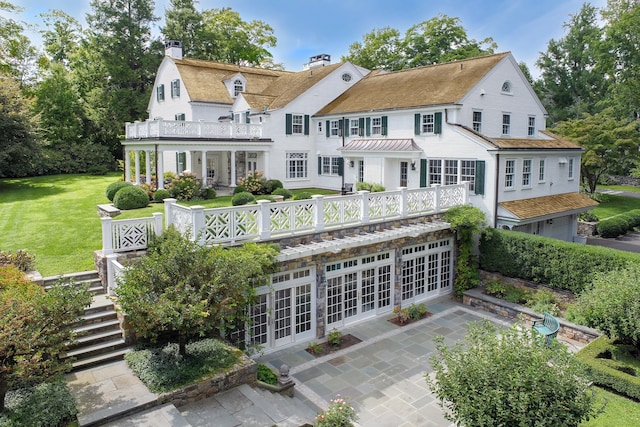 back of house with french doors