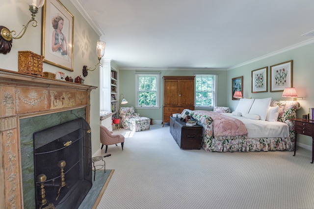 bedroom featuring ornamental molding, carpet, and a fireplace