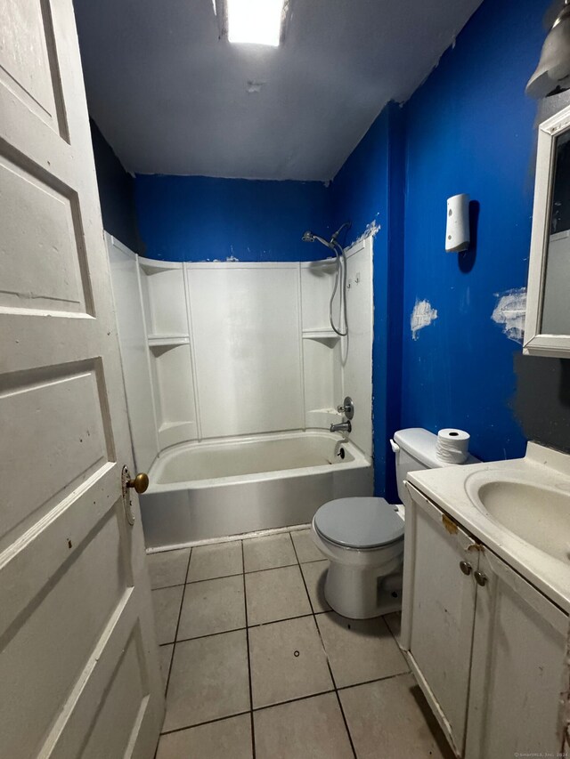 full bathroom with vanity, toilet, shower / bathtub combination, and tile patterned floors