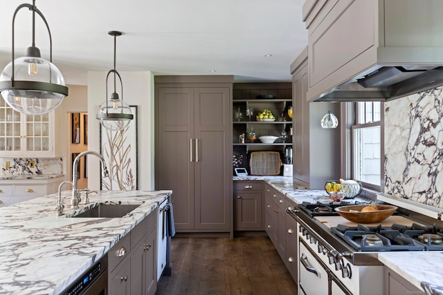 kitchen with sink, light stone counters, gray cabinetry, and dark hardwood / wood-style floors