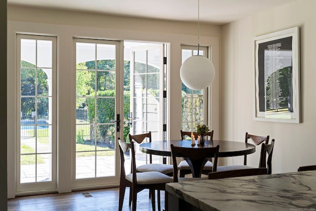 dining room featuring hardwood / wood-style flooring