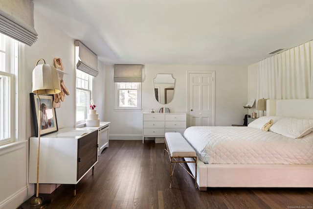 325 Old Mountain Rd, Farmington, CT 06032 - bedroom with multiple windows, baseboards, and dark wood-style floors