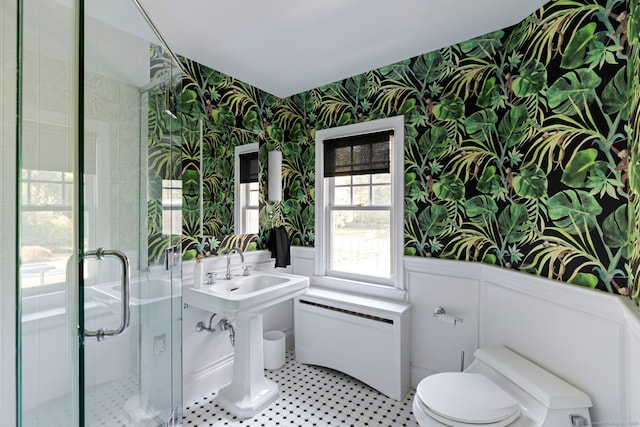 325 Old Mountain Rd, Farmington, CT 06032 - bathroom with wallpapered walls, toilet, a stall shower, a wainscoted wall, and radiator