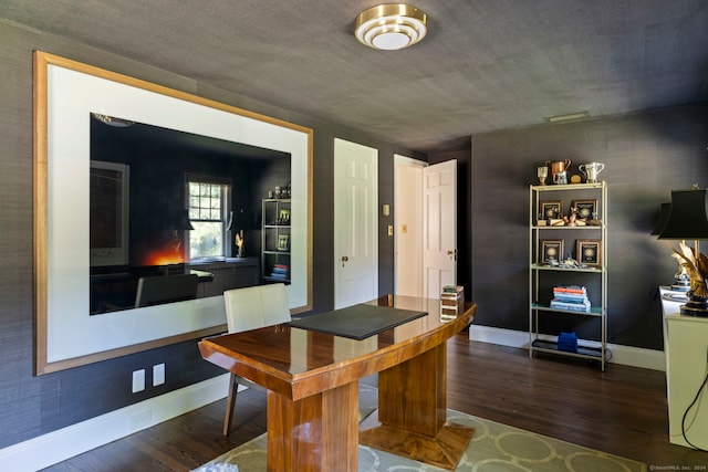 dining space with dark hardwood / wood-style flooring