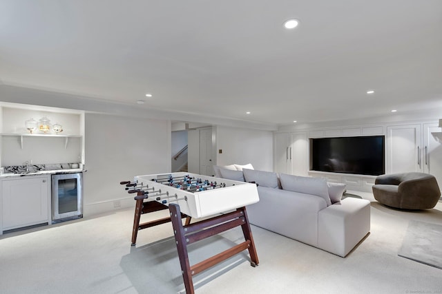 325 Old Mountain Rd, Farmington, CT 06032 - living room featuring beverage cooler, light carpet, recessed lighting, stairs, and bar