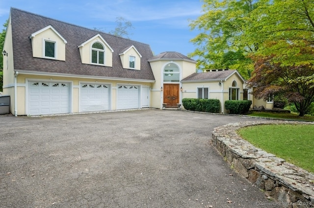 view of front of house with a garage