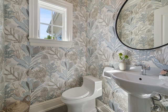 29 Rogues Rdg, Weston, CT 06883 - half bath featuring wallpapered walls, toilet, baseboards, and a sink