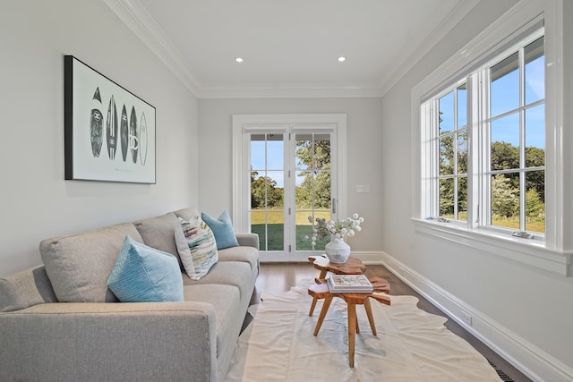 living room with a healthy amount of sunlight and hardwood / wood-style floors