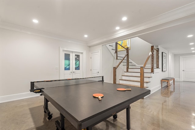 29 Rogues Rdg, Weston, CT 06883 - game room with crown molding, french doors, concrete flooring, baseboards, and recessed lighting