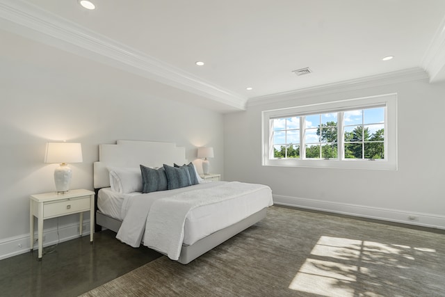 bedroom with ornamental molding and dark hardwood / wood-style flooring