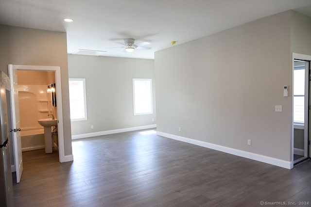 interior space featuring ceiling fan and dark hardwood / wood-style flooring