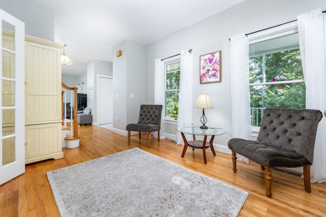 sitting room with hardwood / wood-style floors