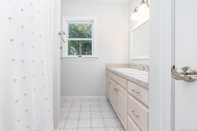 bathroom featuring tile patterned floors and vanity