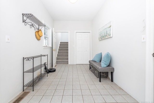 interior space with light tile patterned floors