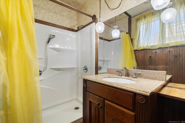 bathroom featuring vanity and walk in shower