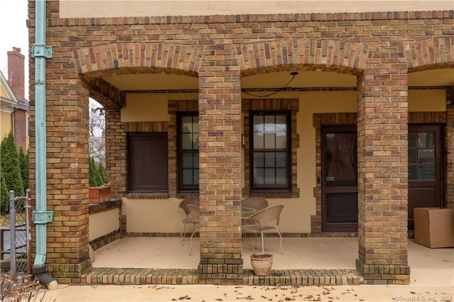 doorway to property featuring a porch