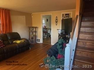 living room with hardwood / wood-style floors