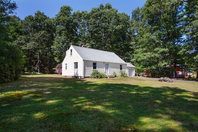 view of property exterior featuring a yard