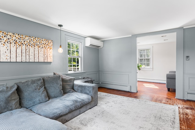 living room featuring wood-type flooring, baseboard heating, and a wall mounted air conditioner