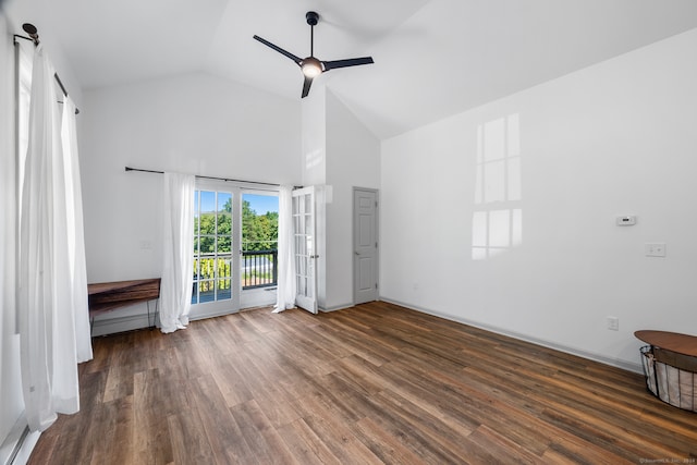 unfurnished bedroom featuring ceiling fan, lofted ceiling, dark hardwood / wood-style flooring, and access to outside