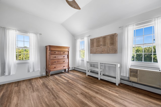 unfurnished bedroom with vaulted ceiling, ceiling fan, and hardwood / wood-style flooring