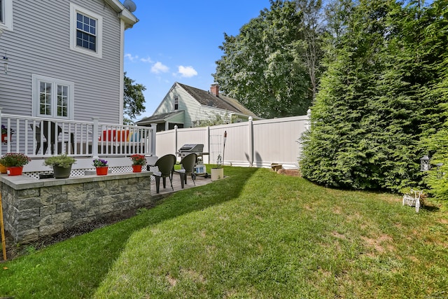 view of yard featuring a deck