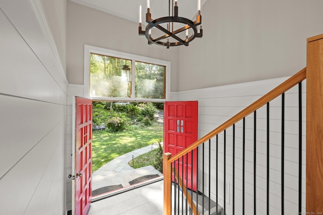 entryway featuring an inviting chandelier