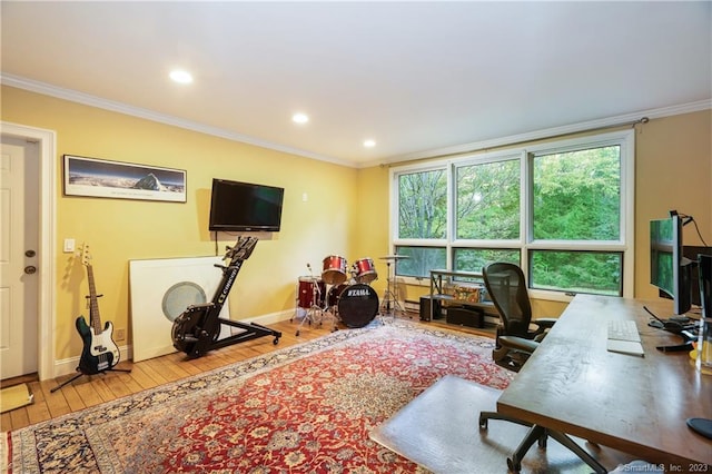 office area featuring ornamental molding and light hardwood / wood-style floors