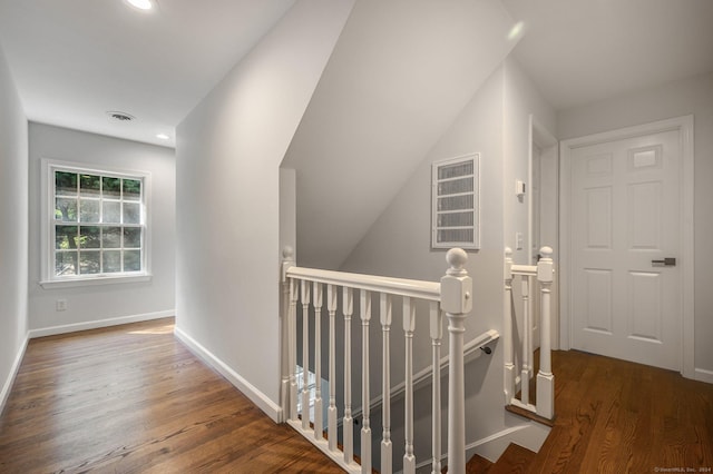 hall with dark hardwood / wood-style flooring