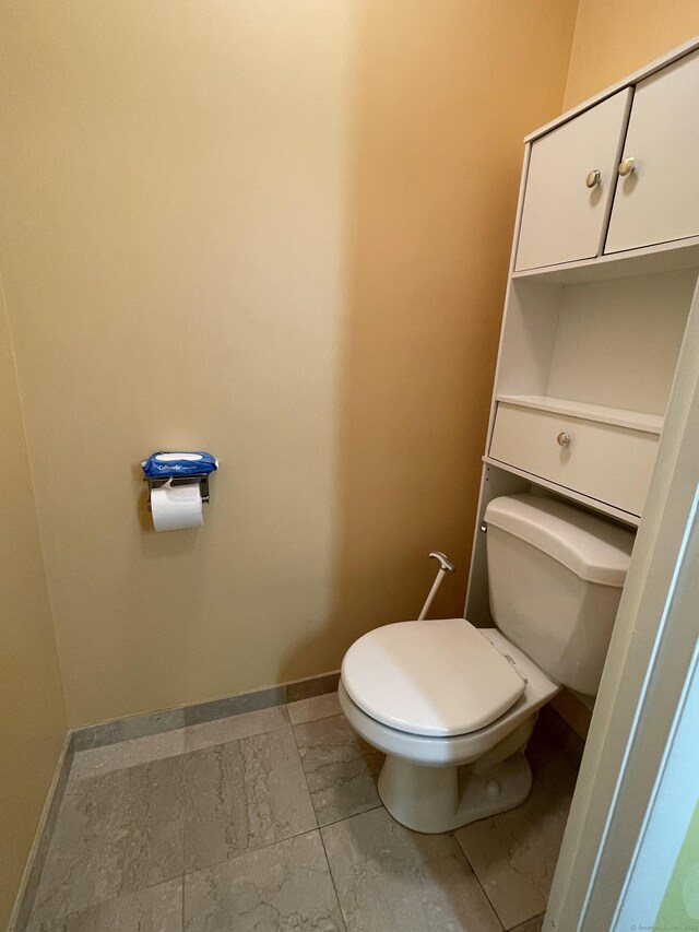 bathroom featuring toilet