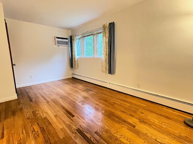 25 Old Middle Rd, Brookfield, CT 06804 - unfurnished room with baseboard heating, wood finished floors, an AC wall unit, and baseboards