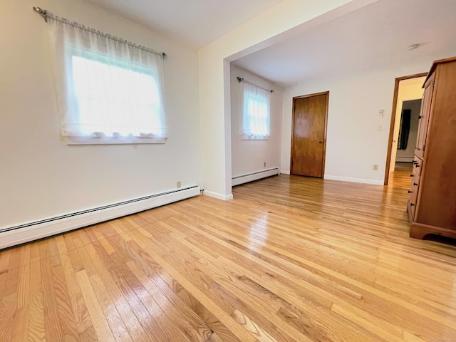 25 Old Middle Rd, Brookfield, CT 06804 - spare room with a baseboard heating unit, light wood-type flooring, and baseboards