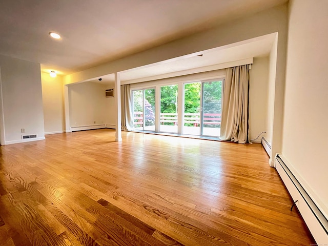 25 Old Middle Rd, Brookfield, CT 06804 - spare room featuring a baseboard heating unit, baseboard heating, light wood-type flooring, a wall mounted air conditioner, and recessed lighting